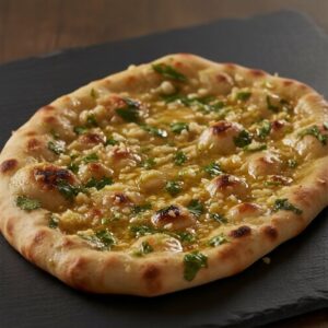 golden-garlic-naan-topped-with-minced-garlic-fresh-coriander-and-melted-butter-at-laree-adda-jersey-city