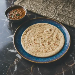 whole-wheat-roti-soft-flatbread-with-curry-top-view